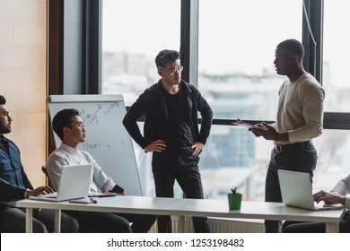 Business Partners Working On New Startup Business Plan, Collaborating And Making Analysis While Meeting Together In Office.