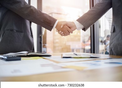 Business Partnership Concept. Businessman Shaking Hands Finishing Up A Meeting,acquisition Concept.