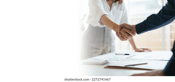 Business partnership concept. Cropped image of two businessmen handshake.