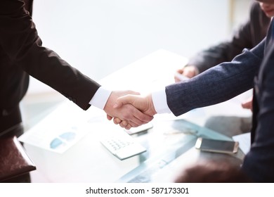 Business partnership meeting concept. Image businessmans handshake. Successful businessmen handshaking after good deal. Horizont