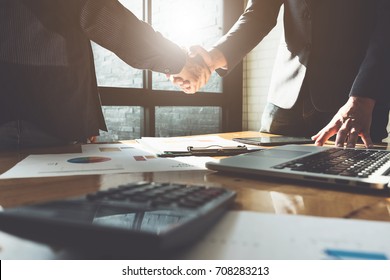 Business partnership meeting concept. Image businessmans handshake. Successful businessmen handshaking after good deal. Group support concept.