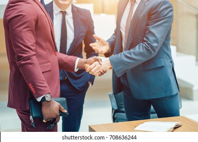 Business partnership meeting concept. Image businessmans handshake. Successful businessmen handshaking after good deal. Horizontal, blurred background - Shutterstock ID 708636244