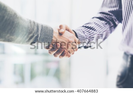 Business partnership meeting concept. Image businessmans handshake. Successful businessmen handshaking after good deal. Horizontal, blurred background [[stock_photo]] © 