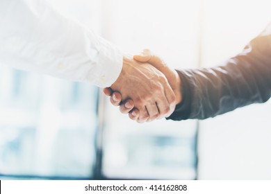 Business partnership meeting. Picture businessmans handshake. Successful businessmen handshaking after good deal. Horizontal, blurred background - Shutterstock ID 414162808