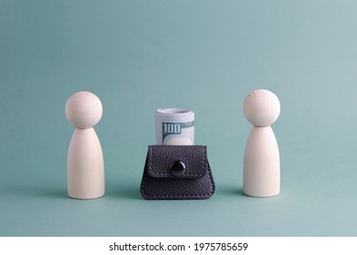 Business Partnerships. Financial Concept, Money Sponsor Or Investor. Wooden Figures, A Small Black Wallet And A Bundle Of Paper Bills On A Light Turquoise Background.