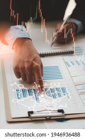 Business people or accountants are analyzing graphs on finance, investment, graph chart hologram in front, business strategy ideas, data analysis technology.