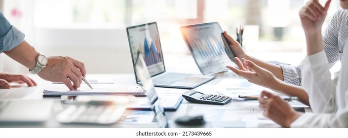 Business people advisor, business people talking, planning analyze investment and marketing on tablet in office. - Shutterstock ID 2173439665