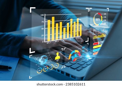 business people analyze virtual graphic financial graph chart diagram on mobile laptop computer, digital technology, business strategy, stock market investment, business finance technology concept - Powered by Shutterstock