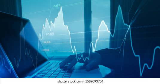 Business People Analyzing Graph Or Trading Stock Exchange With Fibonacci Indicator By Laptop Concept