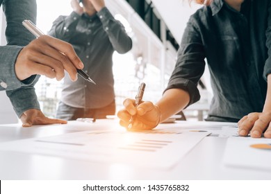 Business people analyzing investment graph meeting brainstorming and discussing plan in meeting room, investment concept - Shutterstock ID 1435765832