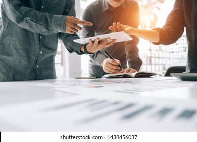 Business people analyzing investment graph meeting brainstorming and discussing plan in meeting room, investment concept - Shutterstock ID 1438456037
