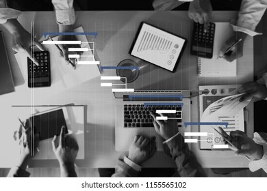 Business People Analyzing  PROJECT MANAGEMENT Updating Gantt Chart