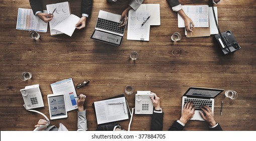 Business People Analyzing Statistics Financial Concept - Shutterstock ID 377884705