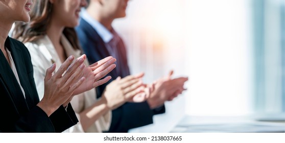 Business people applauding. Group of business people clapping in row. Banner background. - Shutterstock ID 2138037665