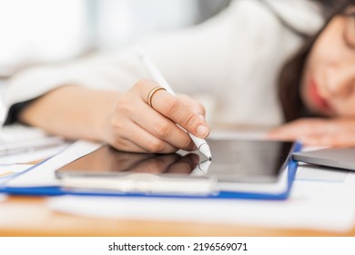 business, people, Asian women paperwork and deadline concept - stressed businessman with papers and charts sitting at table in workplace office - Shutterstock ID 2196569071