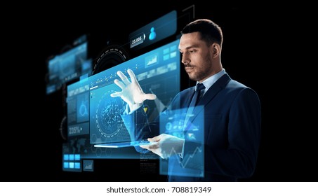 business, people, augmented reality and modern technology concept - businessman in suit working with transparent tablet pc computer and virtual screen projection over black background - Powered by Shutterstock