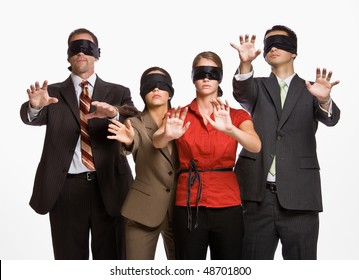 business-people-blindfolds-260nw-48701800.jpg
