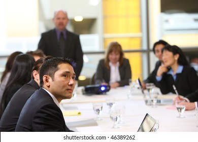 Business People In Board Room Meeting