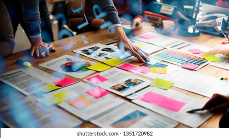 Business people brainstorming on their marketing project - Shutterstock ID 1351720982