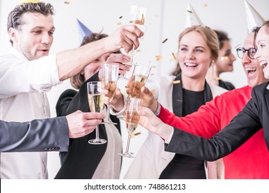 Business people celebrating New Year at office party