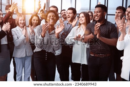 Business people clapping their hands after a seminar