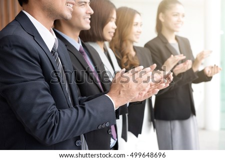 Business people  clapping their hands in the meeting, congratulation and appreciation concepts