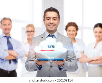 business, people, cloud computing and technology concept - happy smiling businessman in suit holding tablet pc computer transferring data over team