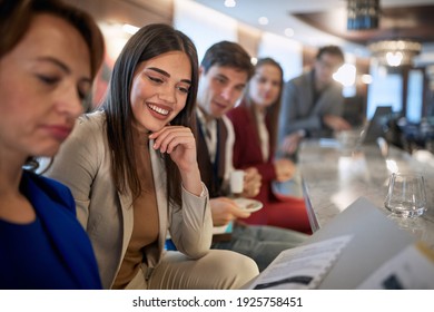 Business people at coffee break in a cheerful atmosphere at the bar. Business, people, bar