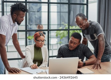 Business people collaborating in office and working on project together - Powered by Shutterstock