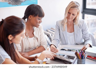 Business people, collaboration and teamwork for magazine, meeting and planning with photograph or clients portfolio review. Designer group and happy people for print, book catalog or marketing agency - Powered by Shutterstock