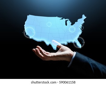 Business And People Concept - Businessman Hand With Map Of United States Of America Over Dark Background