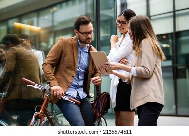 Business people and corporate concept. Portrait of group of business people talking in the city - Powered by Shutterstock