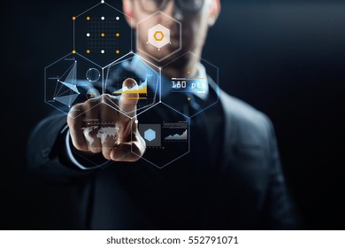 Business, People, Cyberspace And Future Technology Concept - Close Up Of Businessman In Suit Working With Virtual Charts Over Dark Background