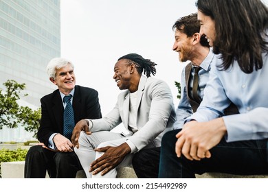 Business People With Different Ages And Ethnicities Talking Together Outside The Office