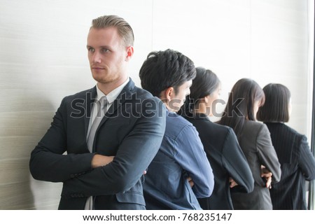 Business people disagree with boss and looking to anather way.