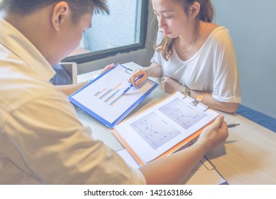 Business people discuss about financial document report - Shutterstock ID 1421631866