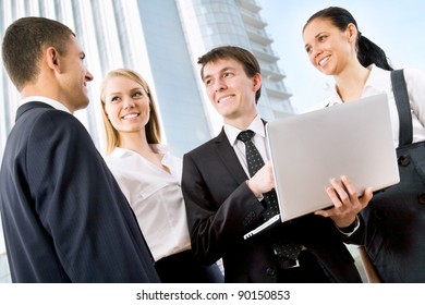 Business People  Discuss A New ?????? Outside Modern Office Building