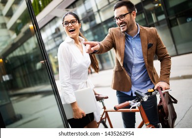 Business people discussing and smiling while walking together outdoor - Shutterstock ID 1435262954