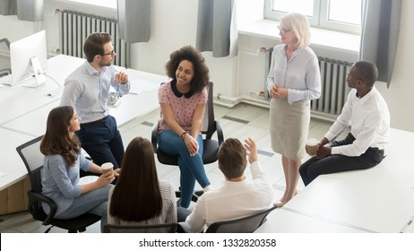 Business People Employees Group Discussing Work Plan With Coach Mentor At Corporate Office Meeting, Multicultural Workers Sales Team Talking At Company Workshop Training, Top View Overhead From Above