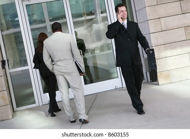 Business people entering and exiting the company - Powered by Shutterstock