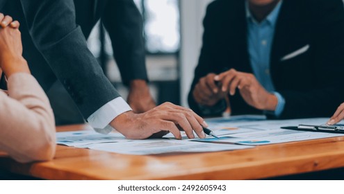 Business People Entrepreneurs Teams are Meeting Discussing and Problem Solving Together Their Project in Conference Room. Professional Entrepreneurship Teamwork are Business Dealing Meeting Together - Powered by Shutterstock