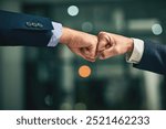 Business people, fist bump and men with partnership, teamwork and company merger with cooperation. Closeup, hands and employees with gesture, collaboration and success with support, power or b2b deal