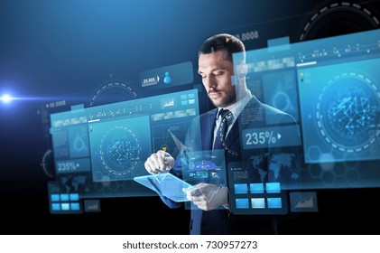 business, people and future technology concept - businessman in suit working with transparent tablet pc computer and virtual screens projection over black background - Powered by Shutterstock