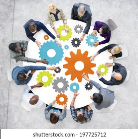 Business People With Gears And Teamwork Concept