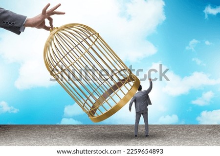 Business people and golden cage concept