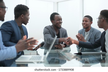 business people greeting each other during a working meeting. - Shutterstock ID 1733889908