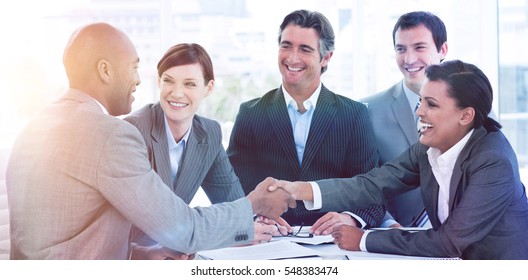 Business People Greeting Each Other In A Meeting