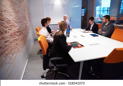 Business People Group With Young Adults And Senior On Meeting At Modern Bright Office Interior.