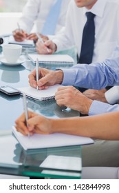 Business People Hands Taking Notes During A Meeting