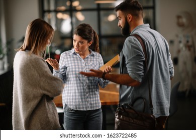 Business People Having An Argument In Office. 
Businessman And Businesswoman  Conflict Problem Working In Team Together.